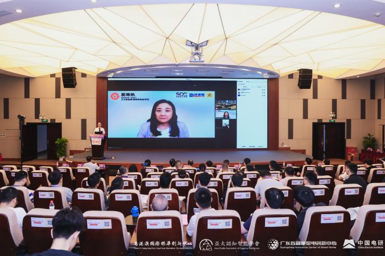 A group of people in a conference room

Description automatically generated